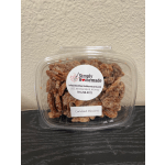 Container of candied pecans with a label