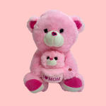 Pink teddy bear holding a smaller bear with "I ♥ MOM" text