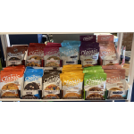 Display of assorted packaged cookies in a store rack