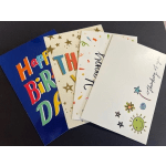 Stack of colorful birthday and thank-you greeting cards