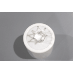 White ceramic container with a silver crown-shaped ring on top