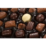 Assorted chocolates in a black plastic tray