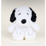 Plush black-and-white dog toy sitting against a plain background