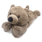 Plush brown teddy bear lying down on a white background