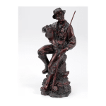 Dark figurine of a seated man holding a fishing rod