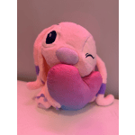 Pink plush bunny holding a purple heart