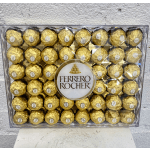 Box of Ferrero Rocher chocolates in gold wrappers