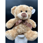 Plush teddy bear with a brown ribbon bow