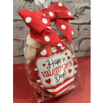 Bag of candy with a red polka-dot bow and Valentine's Day label