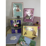 Assorted handmade birthday cards with colorful paper cutout designs