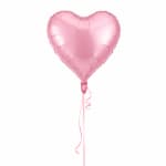 Pink heart-shaped balloon with a curling ribbon