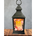 Black lantern with a cardinal and pink blossoms, reading "Cardinals appear when Angels are near"