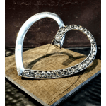 Silver open heart ornament with rhinestones on a wooden base