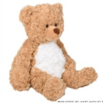 Plush teddy bear with tan fur and a white belly