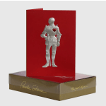 Red greeting card with a silver knight and heart emblem in a gift box