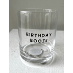 Clear glass tumbler with the words "BIRTHDAY BOOZE" printed on it