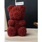 Red rose teddy bear with a small scented candles tag