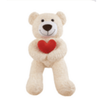 Plush teddy bear holding a red heart
