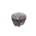 Heart-shaped candy box with assorted wrapped sweets