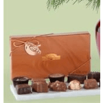 Box of assorted chocolates with a ribbon tie