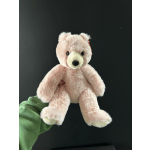 Pink plush teddy bear with cream muzzle and paws