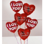 Cluster of red heart-shaped balloons with love messages