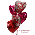 Cluster of heart-shaped Valentine balloons in red, pink, and silver