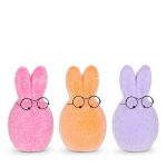 Three fuzzy bunny figurines wearing round glasses
