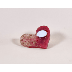Heart-shaped pink glitter candle holder with a small tealight