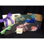 Assorted chocolate gift boxes tied with colorful ribbons