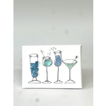 Canvas art of four cocktail glasses with blue and green accents