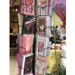 Display rack of Valentine greeting cards and gift boxes in a shop