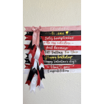 Decorative ribbon banner with assorted greeting text and a pink bow