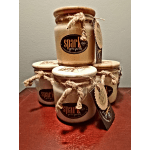 Stack of labeled candles tied with twine