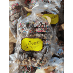 Bag of assorted chocolate-covered treats tied with a ribbon
