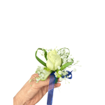White rose boutonniere with baby's breath and blue ribbon
