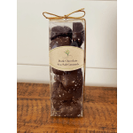 Box of dark chocolate sea salt caramels with a gold ribbon