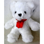 White teddy bear with a red ribbon bow