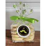 Bag of key lime cookies tied with a green ribbon