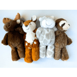 Four plush animal toys—a moose, fawn, pale giraffe, and sloth—lying side by side.