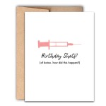 White birthday card with pink syringe graphic and humorous text on the front.