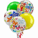 Cluster of colorful congratulatory balloons with printed messages