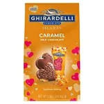 Box of Ghirardelli caramel milk chocolate hearts with heart graphics