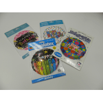 Four packaged birthday balloons with colorful printed designs