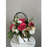 Pink roses and white daisies in a white handled box