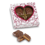Heart-shaped box of assorted chocolates with a few pieces outside