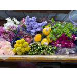 Assorted bouquets of colorful flowers wrapped in plastic