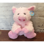 Pink plush pig toy with a tag attached