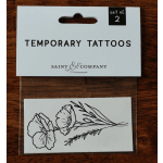 Package of temporary tattoos with two floral line drawings