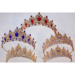 Four jeweled tiaras with red, blue, pink, and clear stones